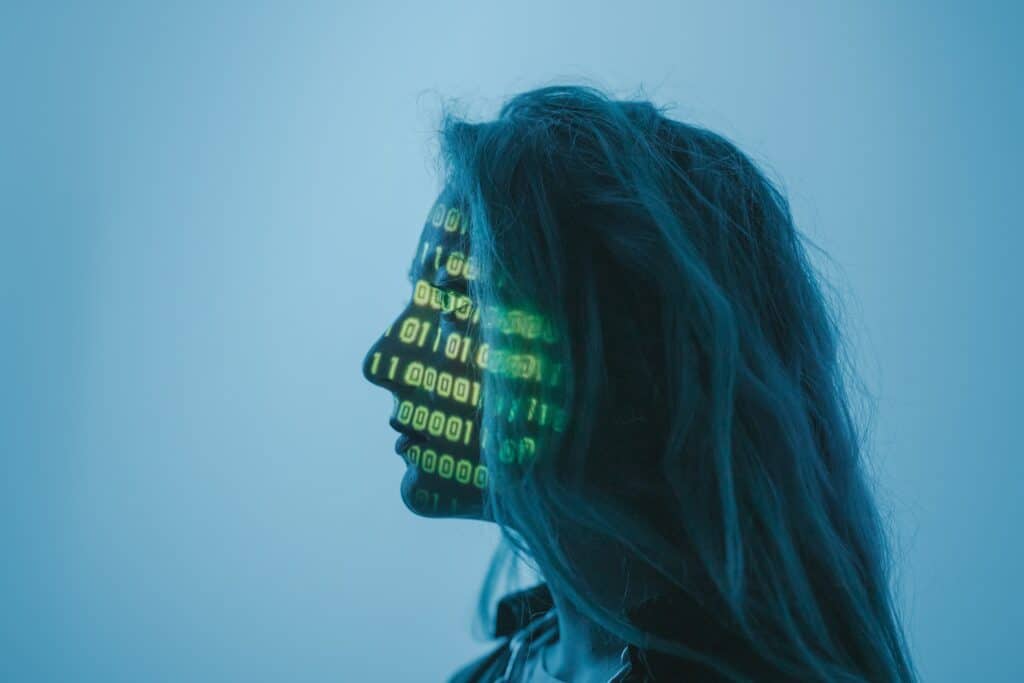 Cybersecurity code on woman's face