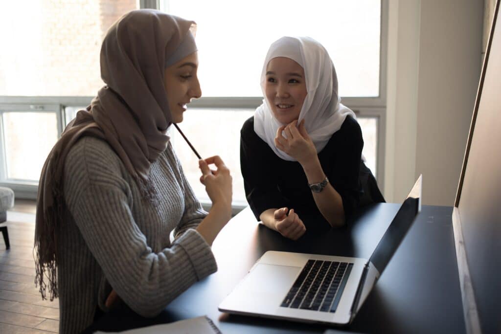 High school STEM research students in discussion